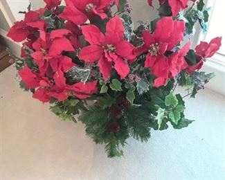 Glimpse of many Christmas flowers and decorations.