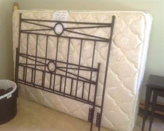 Full size metal bed with mattress and box spring and rails.  Measures 54" wide and 53" high.  Plus footboard. Presale..$125