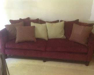 Dark red sofa...measures 96" long x 37" deep x 30" high