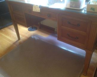 Beautiful wood desk with inlay top covered with glass