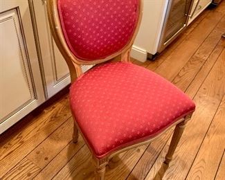 Set of 4 upholstered dining chairs.
