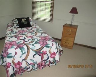 twin bed with bedding