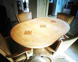 Painted kitchen table, with inset tile, pedestal base and 4 chairs