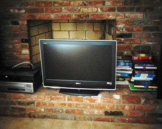 Sony flat screen TV with books in the background