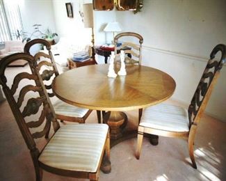 Inlaid oak pedestal table for your dining room with 4 ladder back chair (by Drexel)