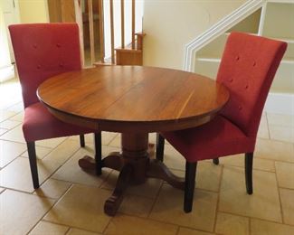 Round pedestal table, set of two (2) parsons dining chairs