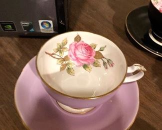 Adderley Floral and Figurine Tea cup and Saucer