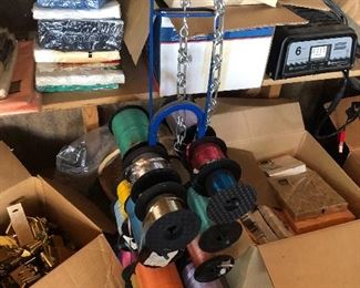 Party store close out loads of paper plates, napkins, papercups, centerpiece terrarium type glass bowls, silver pedastal footed centerpiece vessels, ribbon, ribbon holder