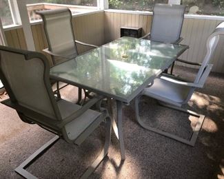 Dining  table and 4 chairs for patio. Purchased at JoPa.