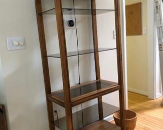 Glass Shelving with light.. Matches the console table.