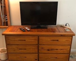Another Dynex TV. This End Up dresser. Has mirror.