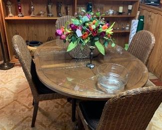 Lovely table and chairs. Top in great condition with glass cover.