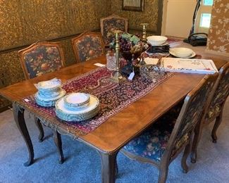 Exceptional dining room table and upholstered chairs