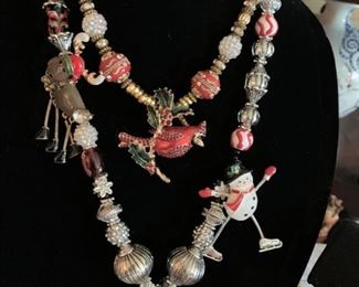 A collection of fun and whimsical holiday jewelry.