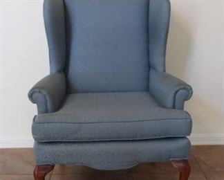 Wing back upholstered armchair