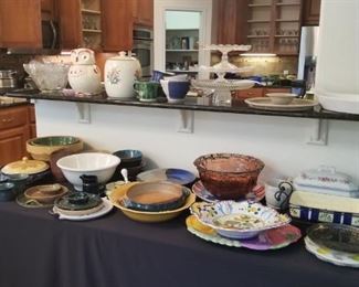 Lots of bowls and kitchen items