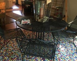 lovely 5 piece patio wrought iron set with arm chairs. Fun and festive Crate & Barrel wool rug in perfect condition.