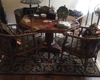 Wonderful game table with one leaf, four chairs, pedestal base
