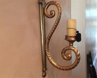 one of two decorative wall sconces