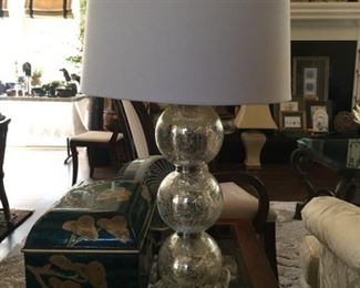 One of a pair of contemporary silver glass lamps 