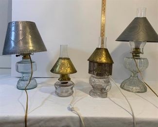 Glass faux oil lamps with metal shades https://ctbids.com/#!/description/share/233739