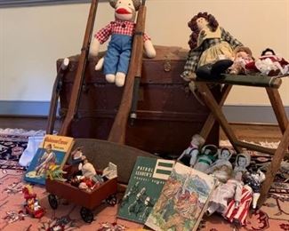 Old chest and assortment of old toys and dolls https://ctbids.com/#!/description/share/233756