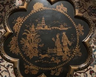 A close of the top of the chinoiserie table