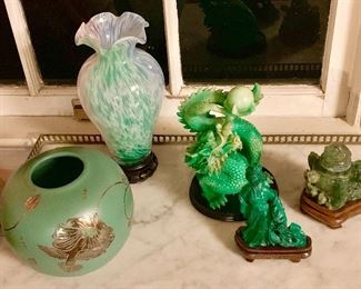 Here we have a collection of green! Contemporary green potoand art glass a carved glass dragon a malachite Chinese goddess and a small jade incense burning   