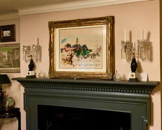 The mantel holds a pair of Napoleon Empire candlesticks circa 1830 pair of small Baccarat vases and a wonderful impressionistic painting by susan Dirk 1973.