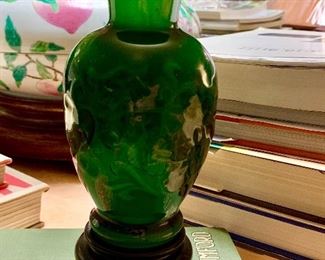 A transplant green glass urn. Circa 1890