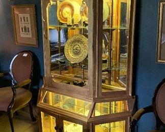 A beautiful gold display cabinet 