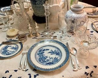 A closeup of a place setting at the table, the china is Booths Lowest Deer, the stemware is London by Orrefors  the sterling is Romance of the Sea by Wallace