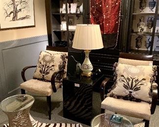 Shelves yet to be filled with 100 silver frames, some of them sterling. In the front is a pair of Dakota Jackson  chairs and a rare bronze pair of Platner tables for Knoll.