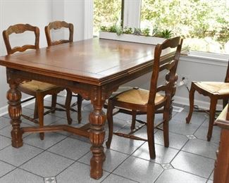 Antique Expandable Carved Oak Dining Table & 4 Chairs with Rattan Seats