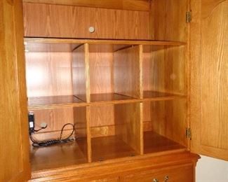 inside the armoire - perfect for your linens or clothing