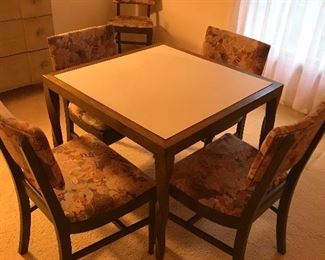 6 Chairs are included with this twisty turned leeged table!