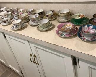 Large selection of vintage teacups and saucers