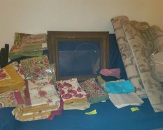 New table linens and kitchen towels. Wool rugs, antique large frame