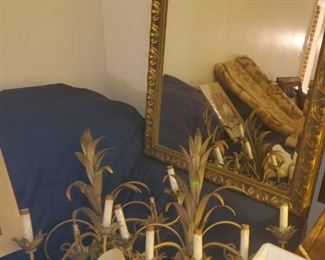 Candle wall sconces and mirror.