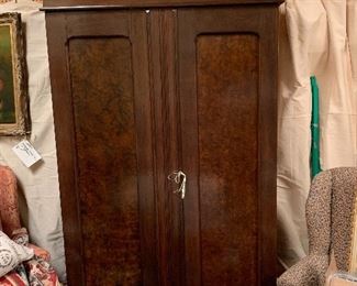 Antique Armoire outfitted with shelves