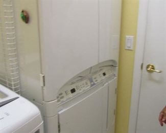DRYER..HAVE NEVER SEEN ANYTHING AS UNIQUE AS THIS.. IT DRYERS TOPS AND ANYTHING ELSE YOU HAVE ON HANGERS WITH NO WRINKLES.. YOU HAVE TO SEE INSIDE.. TURN THE PAGE