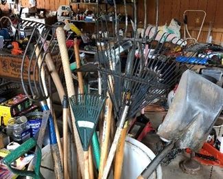 Lots of rakes, forks, shovels.