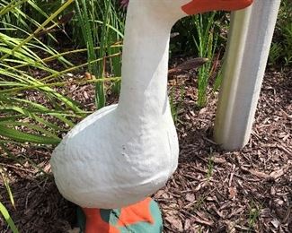 Concrete goose sculpture.