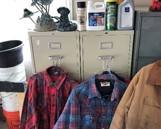 Lots of filing cabinets and clothes for hunting/outdoors.