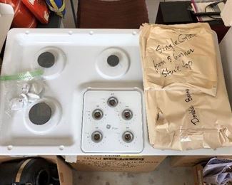 GE stove top. Homeowners switched out many quality appliances and fixtures in order to update their house for the market.