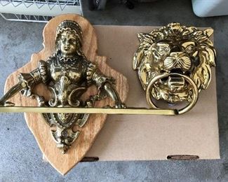 Ornate brass towel rack & knocker (owners used it as a towel holder in bathroom).