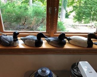 Collection of duck decoys -- see next photo for more.