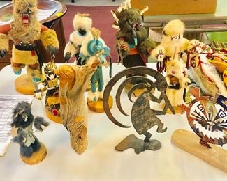 Multiple Kachina dolls and sculptures 