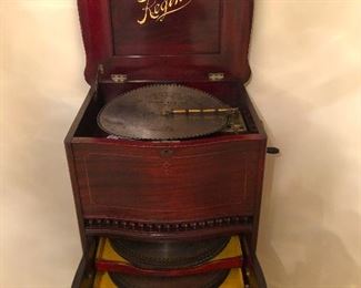 ANTIQUE REGINA MUSIC BOX with CABINET and DISCS