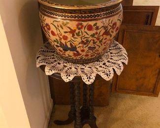 stately planter wearing a neck frill